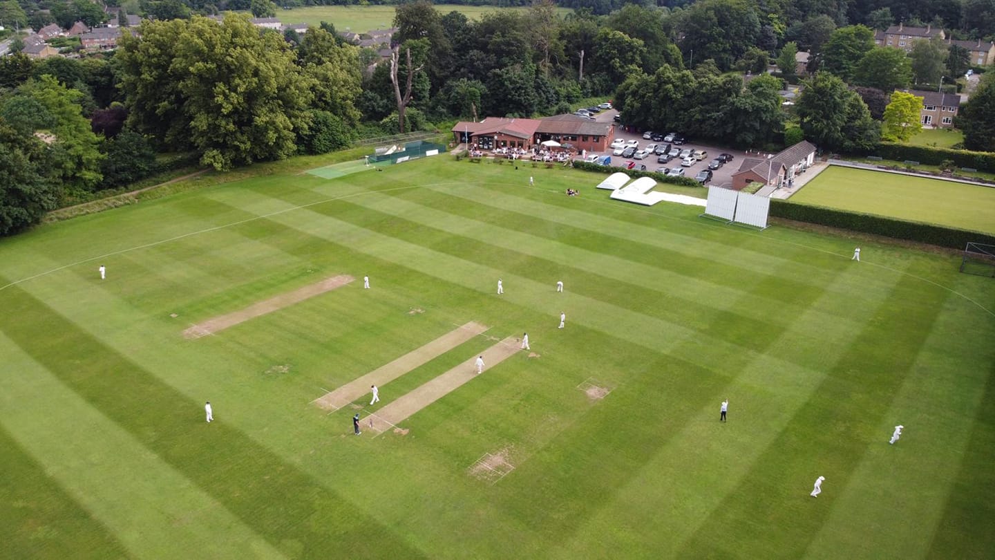 The clubhouse, cricket pitch and bowls green
